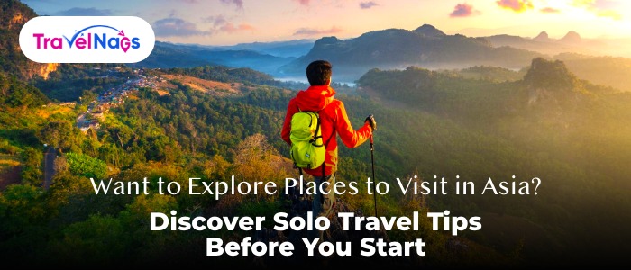 solo travel tips and places to visit in asia with man standing height of mountain